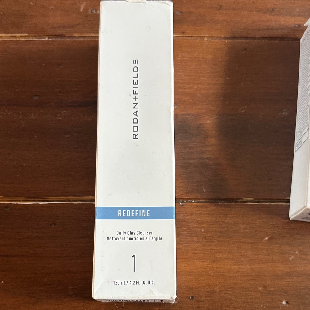 Rodan + Fields Redefine Cleanser in White and Blue
